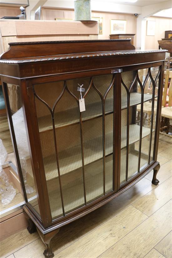 A bow-front china display cabinet, W.122cm